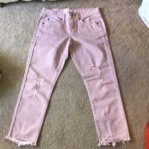 Pink cut up jeans